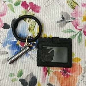 Black keyring wallet, wristlet credit card holder with tassel. New. No tags.